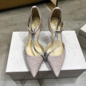 Jimmy Choo . Jimmy cho*o超性感限量水晶链条高跟鞋 …………………………………………………… Go 材料： 面料/黑色-羊京羊皮 粉色-进口特殊布料 内里/柔软羊皮垫脚 鞋底/意大利真皮大底 特点/施华洛世奇钻 ……………………………